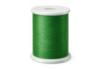 Green sewing thread spool isolated on transparent background, perfect for textile, tailoring, and fashion designs