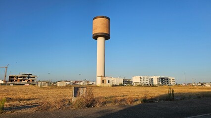 Tall Modern Water Tower in Suburban Residential Area