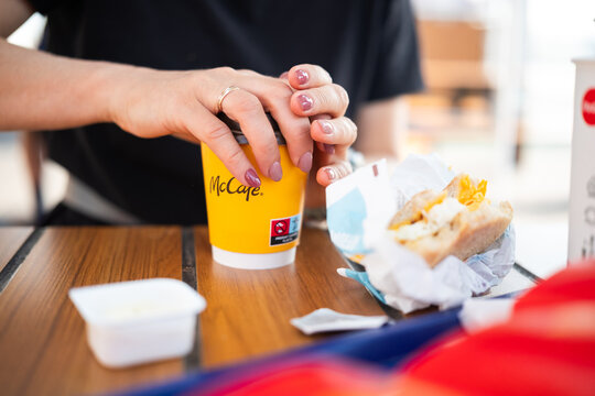 Girl Has S Breakfast With Coffee In Mcdonalds Restaurant