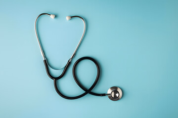 Medical Stethoscope on Blue Background Representing Healthcare, Diagnosis and Clinical Tools