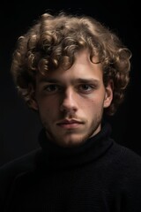 Obraz premium Serious Blonde Man in Black Turtleneck