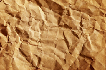 Old grunge crumpled brown paper texture with dirty brown stain