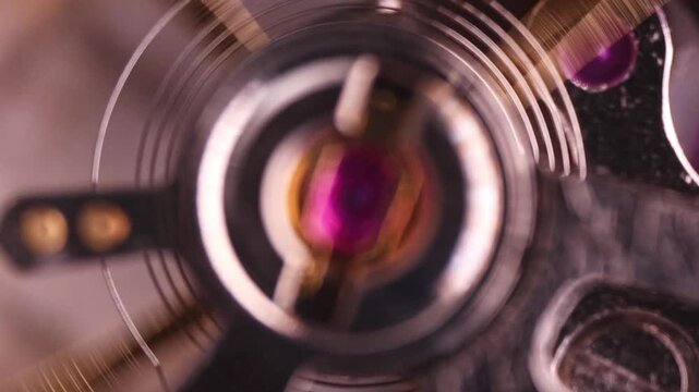 Slow motion clockwork close-up, concept of smooth flow of time