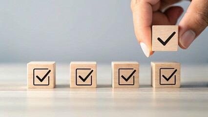 Wooden cubes with checkmarks checklist task completion