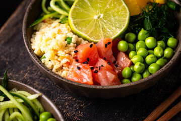 Healthy bowl with salmon and vegetables