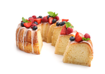 Pieces of delicious bundt cake with berries, glaze and mint isolated on white