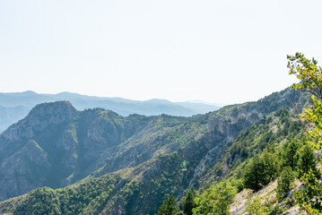 Naklejka premium Landscape of Bosnia and Herzegovina mountains hill peak range haze summer Europe