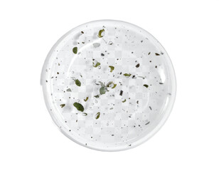 Obraz premium Delicate herbal infusion in clear glass vessel reveals natural botanicals and refreshing clarity