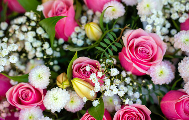 Elegant Pink and White Rose Bouquet with Delicate Accents.