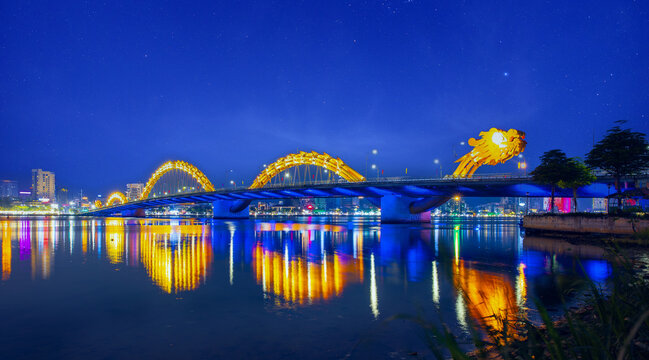 Night view of dragon bridge illuminated over han river in Da nang Vietnam, Famous landmark