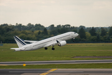 Airplane at the airport. Passenger plane taking off