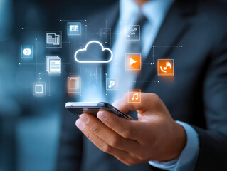 Businessman using smartphone to access cloud-based digital content and multimedia services