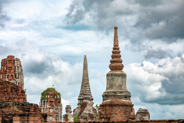 Fototapeta premium Archaeological remains of the Wat Maha That temples within the Wat Phra Ram Park complex in Ayutthaya, Thailand