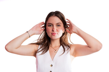 Obraz premium Studio Portrait of Young Woman with Natural Look and Sleeveless Blouse