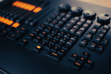 Mixing consoles are devices for creating high-quality sound. control of sound sources at concerts and holidays. Audio channel strips and frequency and volume control sections. High quality photo
