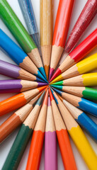 Fototapeta premium tips of colored pencils arranged in a circle.