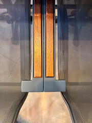 Symmetrical Top-Down Detail of Two Chairs with Wooden Armrests