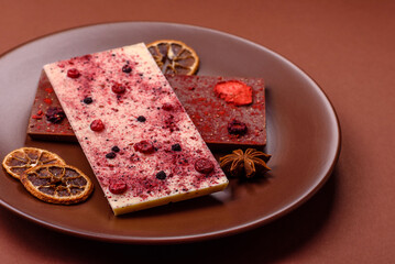 Bar sweet craft artisan chocolate with dried fruits made at home. Craft chocolate