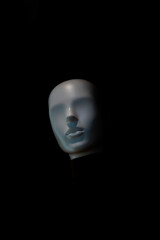 Dramatic Low-Key Portrait of a Mannequin Head with Moody Lighting.