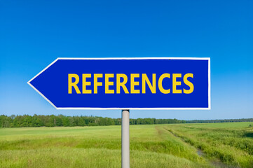 References or reference symbol. Concept word References on beautiful blue road sign. Beautiful blue sky green grass forest peaceful nature background Business references reference concept Copy space