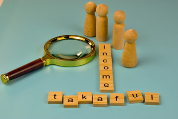 A magnifying glass examines the connection between income and insurance