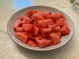 Bowl of freshly cut watermelon pieces