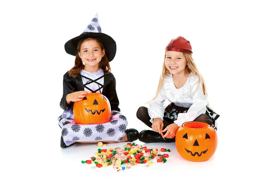 Halloween: Girls Going Through Halloween Candy