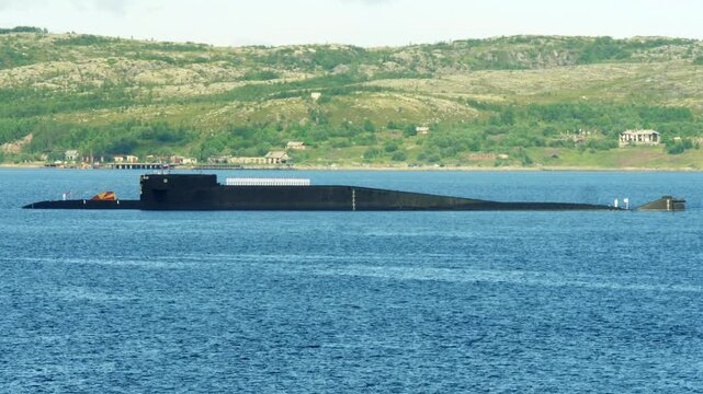 A nuclear-powered submarine is anchored in the Kola Bay during the annual Navy Day holiday.