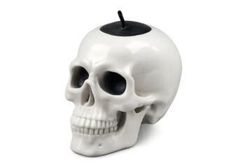 Obraz premium Glossy white ceramic skull featuring dripping black candle wax, symbolizing gothic decor against transparent backdrop