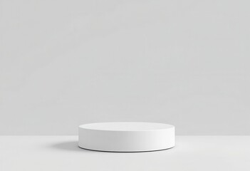 Empty white round podium on a plain background.