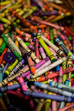 rainbow color crayons in pile