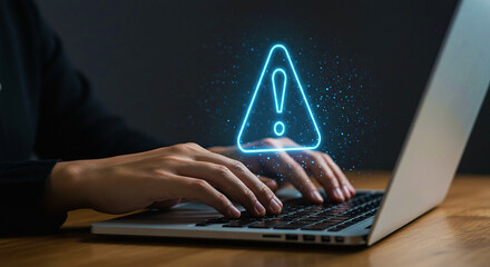 Cybersecurity specialist working on a laptop with a glowing warning sign, representing a critical security alert, data risk, or virus threat. This highlights the importance of digital protection and o