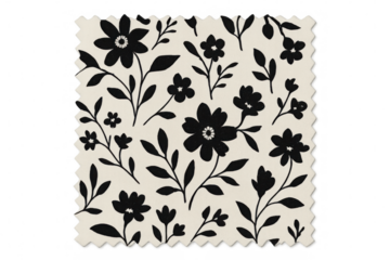 Fabric swatch revealing intricate black floral pattern spreading across soft beige textile surface with transparent backdrop