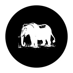 Majestic elephant silhouette in a circle creating a striking contrast of black and white design with grass