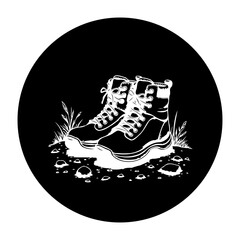 High contrast graphic illustration of hiking boots footwear on a dark background and white details