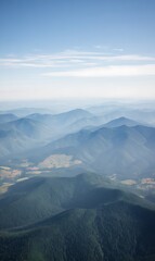 Obraz premium Mountains fade into the hazy horizon