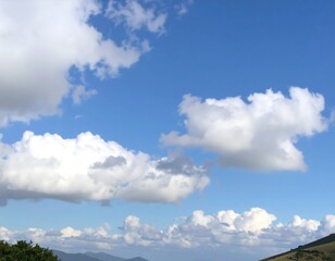 Cumulus clouds in a vibrant blue sky