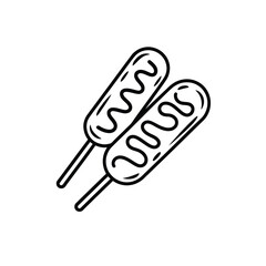 Two corn dogs with ketchup drizzle on sticks © firoj