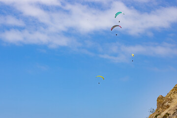 People paragliding over Black Beach La Jolla California 2025 