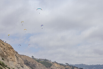 Paraglider flying high over Torrey Pines San Diego California 2025
