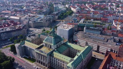 Aerial panorama view around the capitol city Munich in Germany on a sunny summer day.