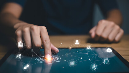 Person touching digital interface with glowing connection icons and data visualization technology hand