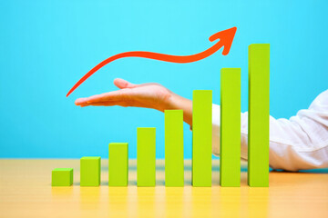 Rising Green Bar Graph with Red Arrow on Blue Background, Representing Business Growth, Financial Success, and Positive Market Trends in a Dynamic Economy