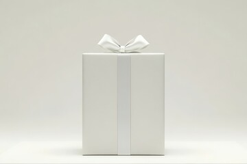 White gift box with ribbon and bow.