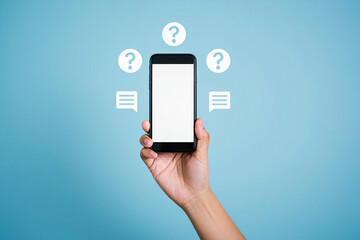 Hand holding a smartphone with question marks and chat bubbles above