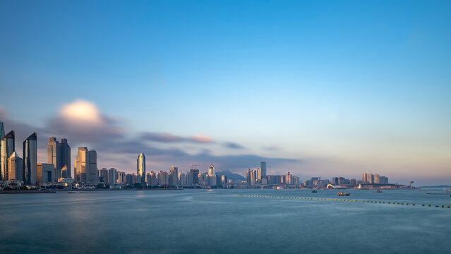 Coastal City Skyline at Sunrise