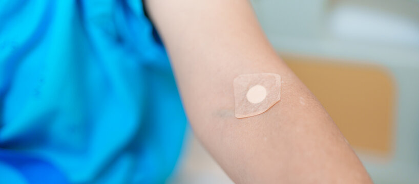 Elderly asian Patient Woman with medical patch plaster after blood test in hospital. Diagnose, illness, treatment, Insurance, Healthcare, medical Examination, Blood donation and World Blood Donor Day