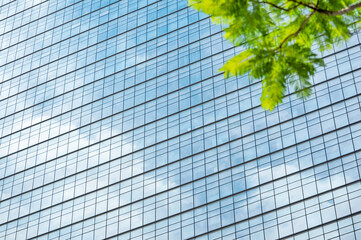 Modern office building with green trees
