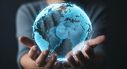 Photo of a digital globe is held in hands, symbolizing global technology and connection