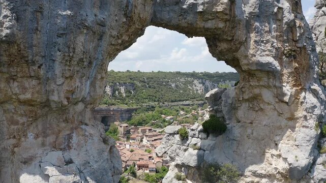Aerial view of the town of Puentedei, province of Burgos, Spain. A place built on a huge stone tunnel through which the river passes.